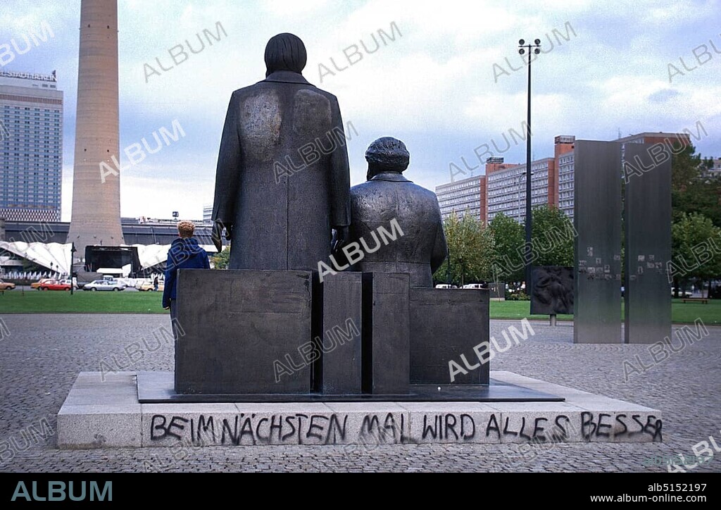 Marx Engels monument at the Marx Engels Forum, background television tower, festival of unity, Berlin, Germany
