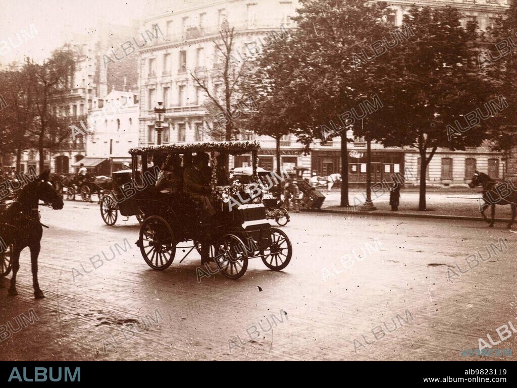 History of the automobile; car on a street; Paris; 1895; France; digitally restored reproduction from a 19th 20th century original; Europe.