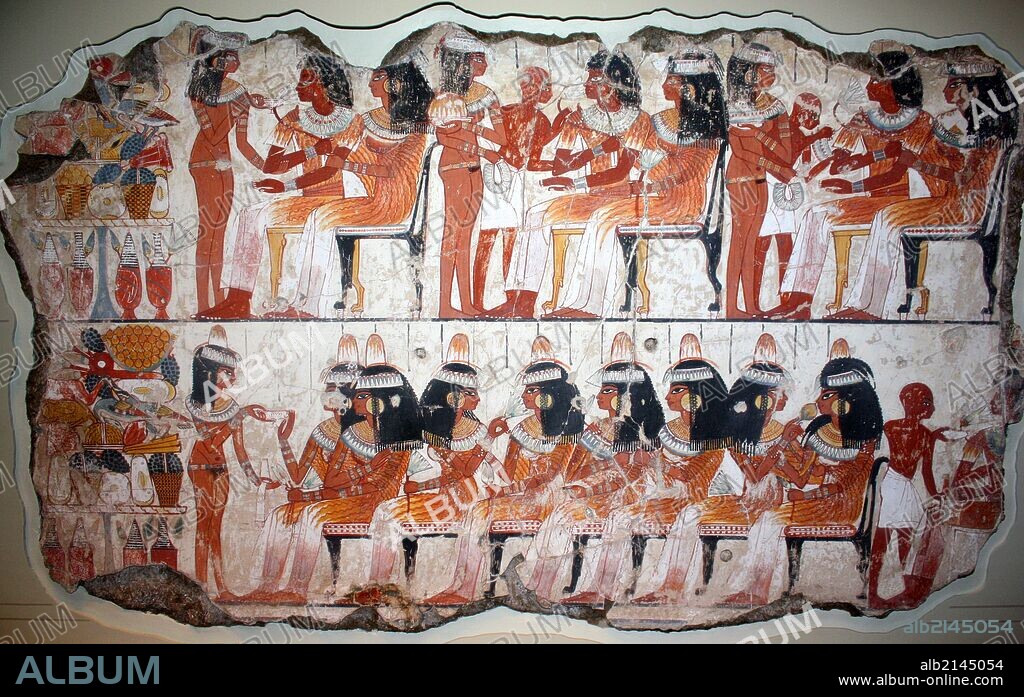 A feast for Nebamun. An entire wall of the tomb-chapel showed a feast in honour of Nebamun. Naked serving girls and servants wait on his friends and relatives. Married guests sit in pairs on fine chars, while the young women turn and talk to each other. This erotic scene of relaxation and wealth is something for Nebamun to enjoy for all eternity. The richly dressed guests are entertained by dancers and musicians, who sit on the ground playing and clapping (Photo by: Universal History Archive/UIG via Getty Images).