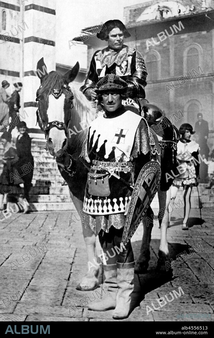 Jockey of the district of the Unicorn during the Palio of Siena, 1910-20.