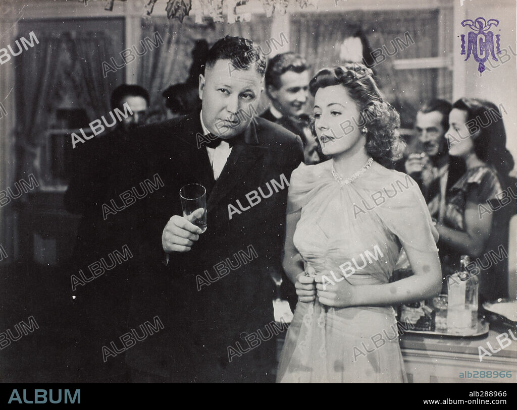 EDGAR BUCHANAN and IRENE DUNNE in PENNY SERENADE, 1941, directed by GEORGE STEVENS. Copyright COLUMBIA PICTURES.