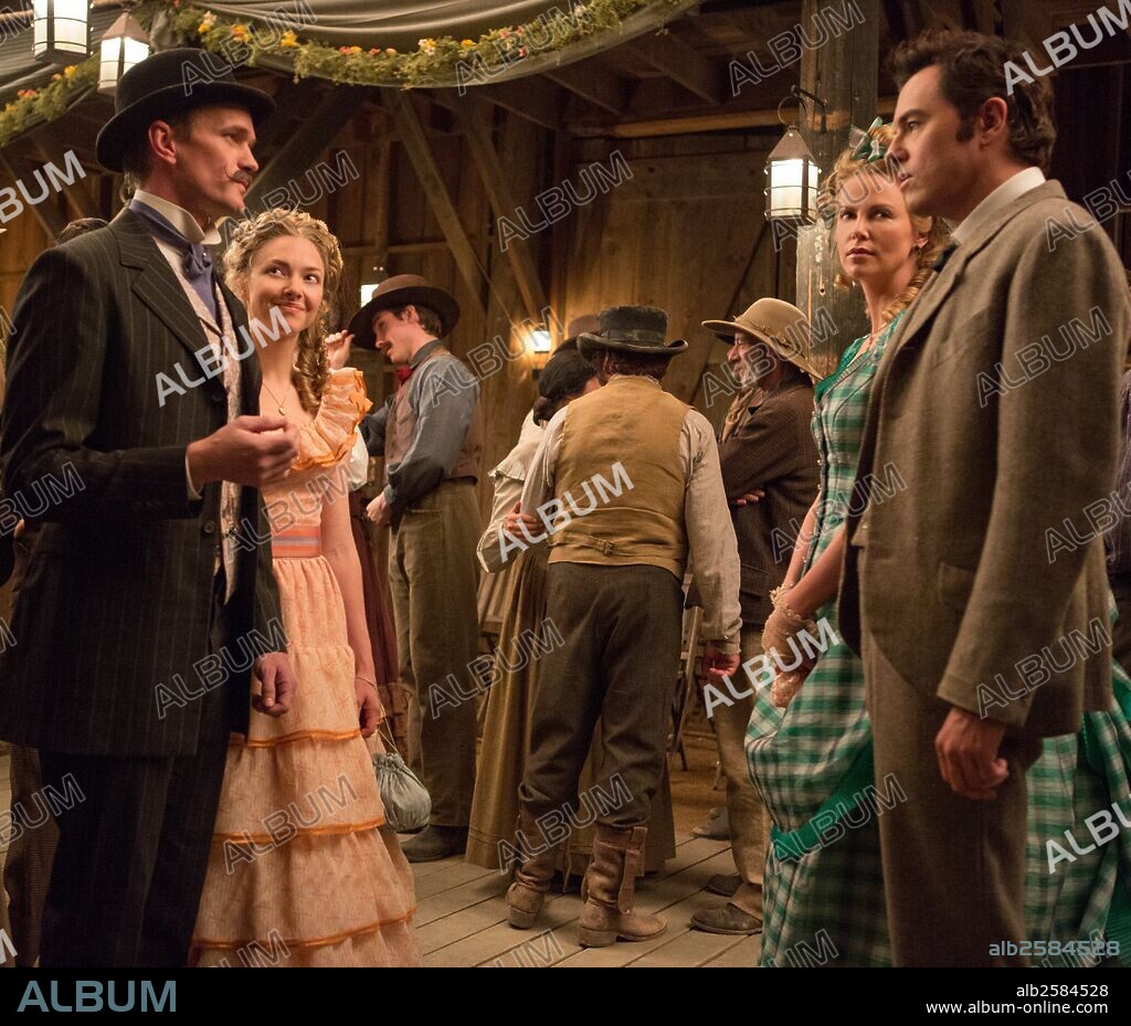 AMANDA SEYFRIED, CHARLIZE THERON, NEIL PATRICK HARRIS and SETH MACFARLANE in A MILLION WAYS TO DIE IN THE WEST, 2014, directed by SETH MACFARLANE. Copyright MEDIA RIGHTS CAPITAL.