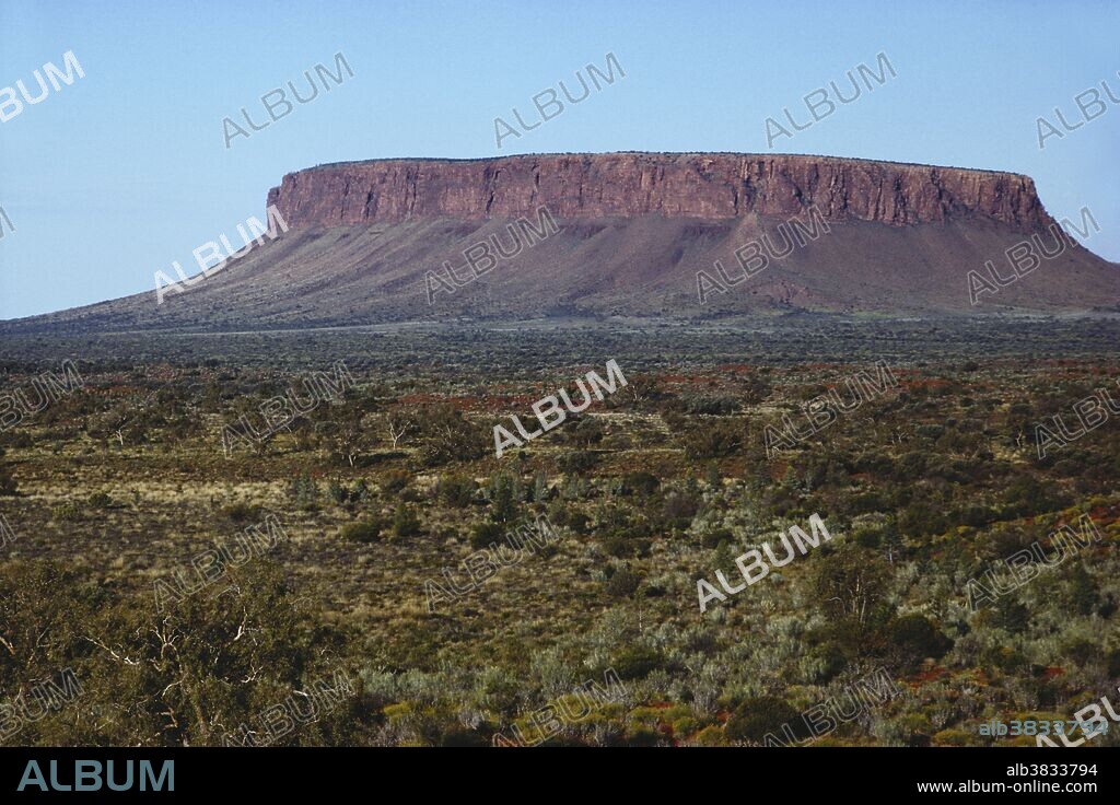 Mount Connor, a mesa in central Australia, 150 miles southwest of Alice Springs.  With its hard cap of sandstone, it is over 1000 feet above the surrounding plain.
