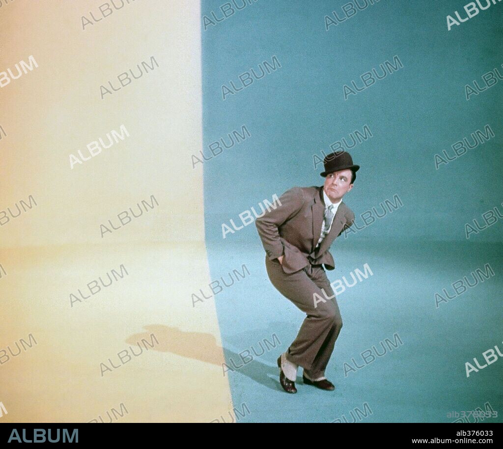 GENE KELLY in INVITATION TO THE DANCE, 1956, directed by GENE KELLY. Copyright M.G.M.