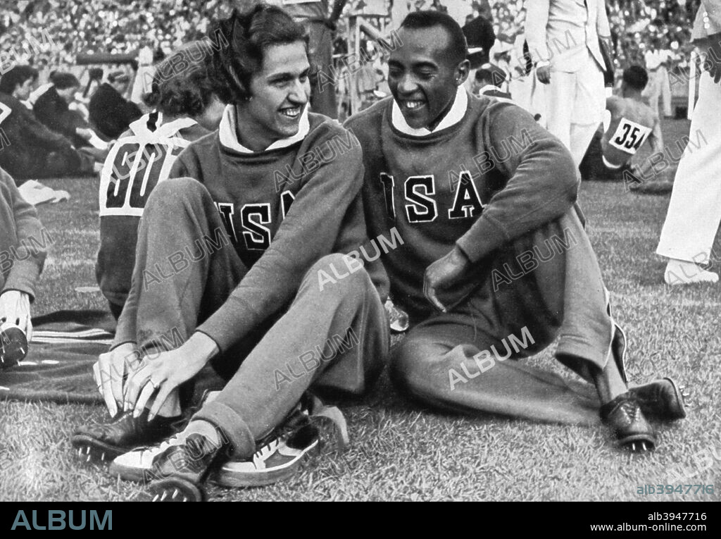 Helen Stephens and Jesse Owens, American athletes, Berlin Olympics, 1936. The two won six gold medals between them: Stephens in the women's 100 metres and 4x100 metres relay and Owens in the men's 100 metres, 200 metres, 4x100 metres and Long Jump. A print from Olympia 1936, Die Olympischen Spiele 1936, Volume II, Cigaretten-Bilderdienst, Hamburg, 1936.