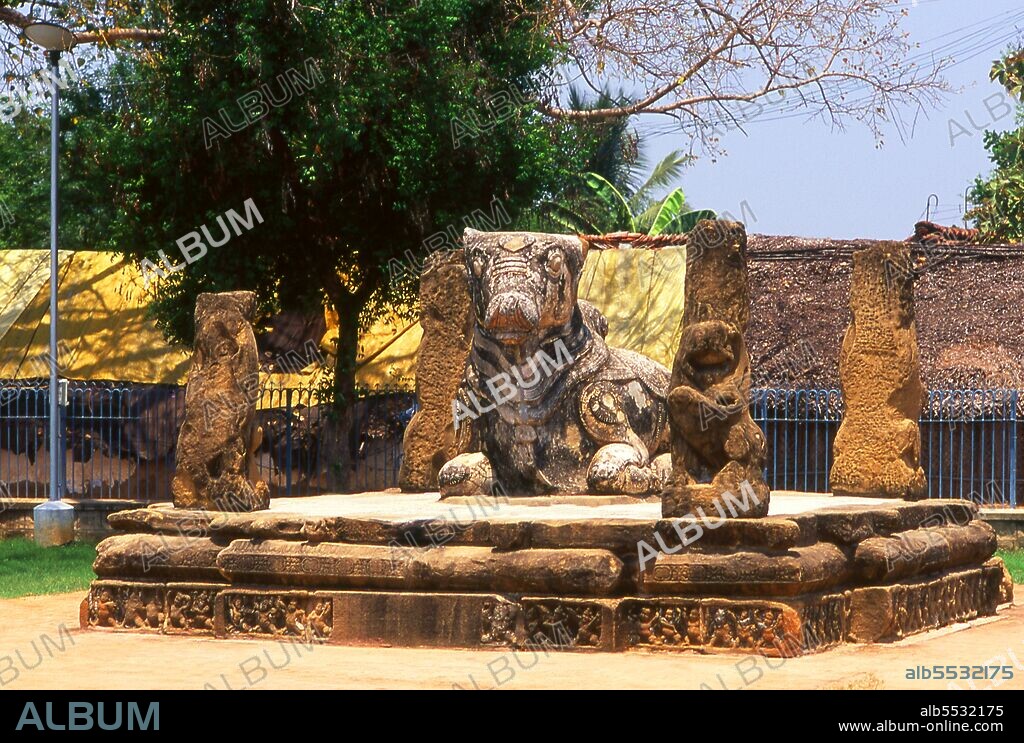 Nandi (Nandin) the Bull was the mythical mount of the god Shiva in Hindu mythology. The Kailasanathar (Lord of the Cosmic Mountain) temple is a Hindu temple in the Dravidian architectural style. It is dedicated to the god Shiva, and was built between 685 and 705 CE by the Pallava Dynasty ruler Rajasimha. Construction was completed by Raajasimha's son, Mahendra Varma.