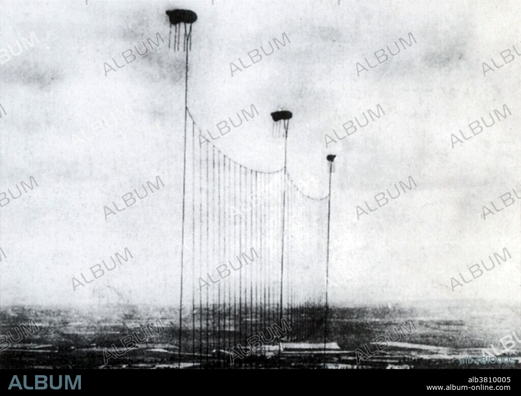 Barrage Balloons were lighter-than-air balloons that were flown over ships and buildings, as a protection against low-flying aircraft. The balloons were tied down by a very strong cable, so the balloon was quite large. In theory, any aircraft that dived too low to shoot or bomb a target would fly into this and crash.
