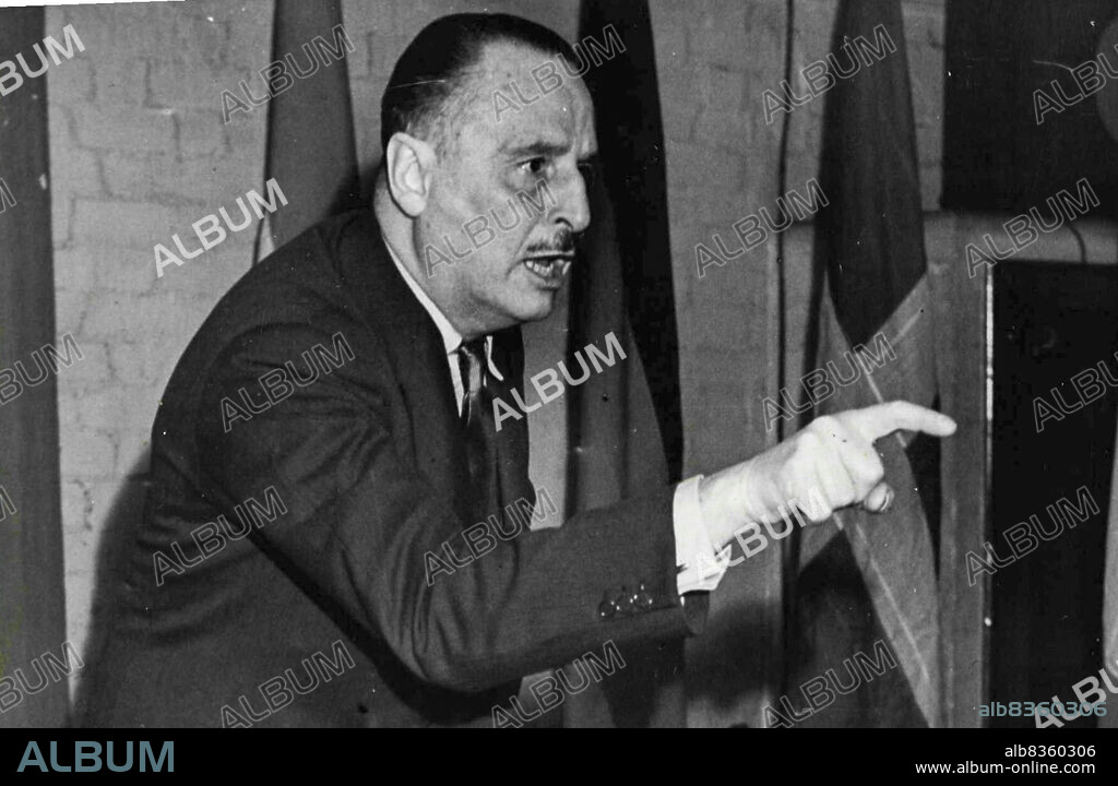 Sir Oswald Mosley Returns to Politics.
Sir Oswald Mosley speaking during the meeting at Bethnal Green.
Sir Oswald Mosley formerly Leader of the British Union of Fascists, broke a three year silence when he addressed a meeting of several hundreds of us Union Movement supporters at Wilmot St, School, Bethnal Green, east London.
Sir Oswald Mosley, now 58 years of age, was making his first "political" appearance since February 1951 and its is understood that he now plans to return to the political arena. February 11, 1954.