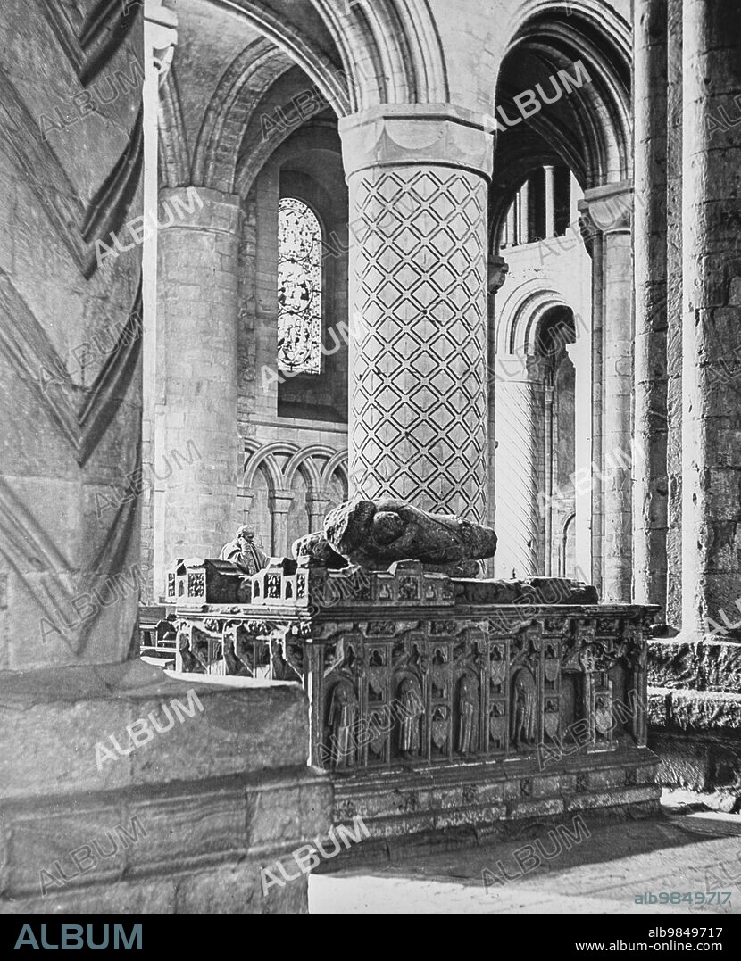 A magic lantern slide circa 1900. Religious slides. Tomb of John de Neville, 3rd Baron Neville de Raby. John was born at Raby Castle between 1337 and 1340. Sir John died in 1388 at Newcastle Upon Tyne and is entombed at Durham Cathedral with his first wife; Durham, York, England.