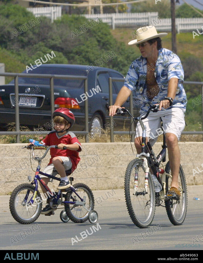 Jun 06, 2001; Pacific Palisades, CA, USA; Australia & UK Out! Exclusive! Actor PIERCE BROSNAN (dashing womanizer JAMES BOND) spends the afternoon with fiancee Keely Shay Smith, teaching their son DYLAN (3) the joys of pedal-power. Mandatory Credit: Photo by Jonathan Moffat / ZUMA Press. (©) Copyright 2001 by Jonathan Moffat. 06/06/2001