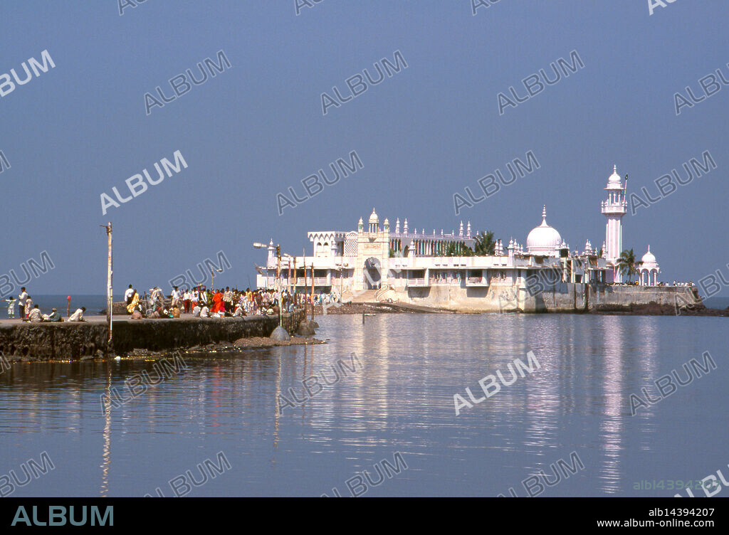 India: Haji Ali Mosque and Dargah, Worli Bay, Mumbai. The dargah is built into the sea and houses the grave of Muslim saint Pir Haji Ali Shah Bukhari. The dargah was constructed in 1431.