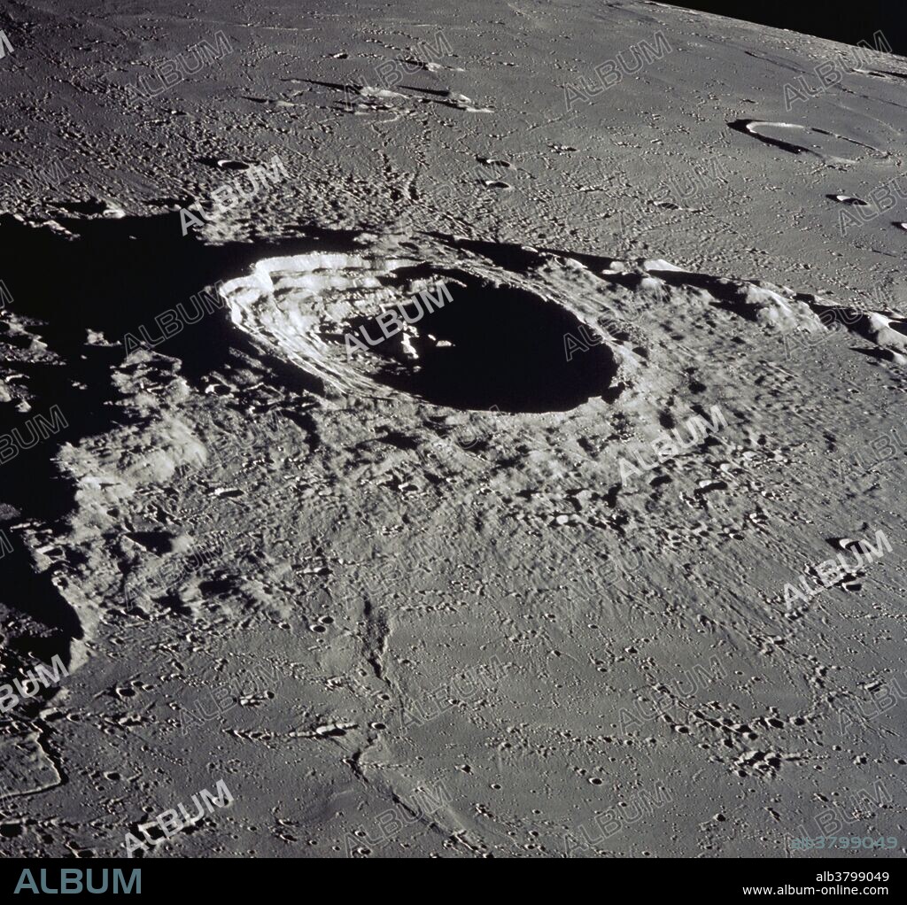 Apollo 12 mission view of Eratosthenes, a deep lunar impact crater. Principal point latitude was 15.0 N by longitude11.5 W. There was a low sun angle. Approximate camera tilt was 65-75 degrees and the direction of the tilt was North.