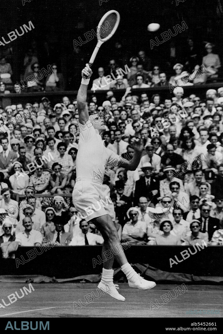 Shot From Seixas :America's Victor Seixas in play against Mervyn Rose, of Australia, during their center court, semi-final match in the Wimbledon tennis championships at the All-England Club here. July 01, 1953.