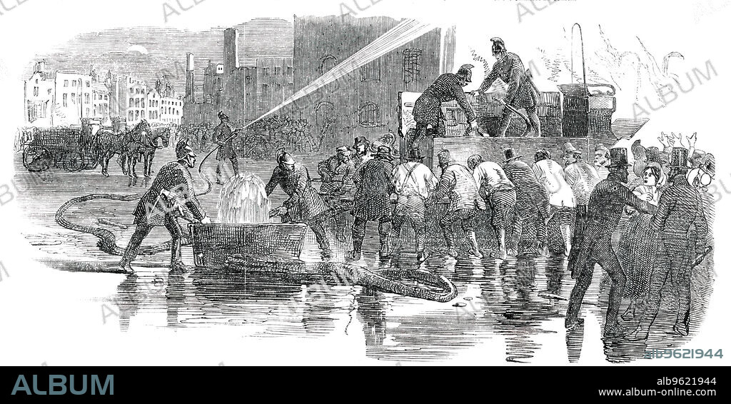 The Fire-Brigade, 1850. Fire in Lambeth, south London: 'The flames were first discovered by a policeman of the L division, and engines from various stations quickly arrived at the scene. Before, however, water could be procured, the flames had attained so great an ascendancy, that the atmosphere was illumined for miles round, and the utmost alarm was occasioned among the inhabitants of the neighbourhood...The firemen worked bravely; but the extent of the catastrophe was appalling'. From "Illustrated London News", 1850.
