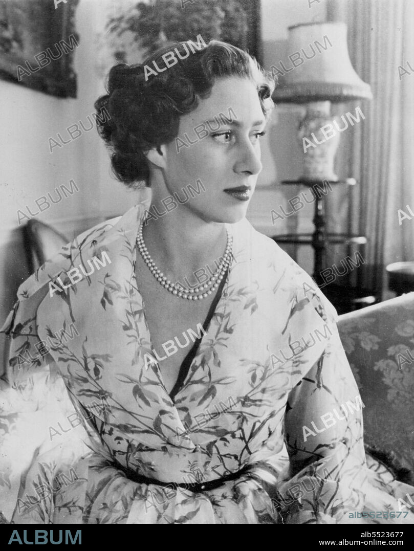 Princess Margaret Birthday Portrait - This Portrait of Princess Margaret was made in the Morning Room at Clarence House, London, especially for her 24th Birthday Anniversary of August 21, the Photographer was Cecil Beaton. Princess Margaret, sister of Queen Elizabeth, is third in the order of Succession to the Throne the Queen's Children, Prince Charles and Princess Anne, take precedence of her.
Clarence house, only a stone is throw from Buckingham Palace ***** where Princess Margaret lives with the Queen Mother. 
It was the home of the Queen from the Time of her Marriage until her Accession to the Throne. May 06, 1955. (Photo by Cecil Beaton, Associated Press Photo).