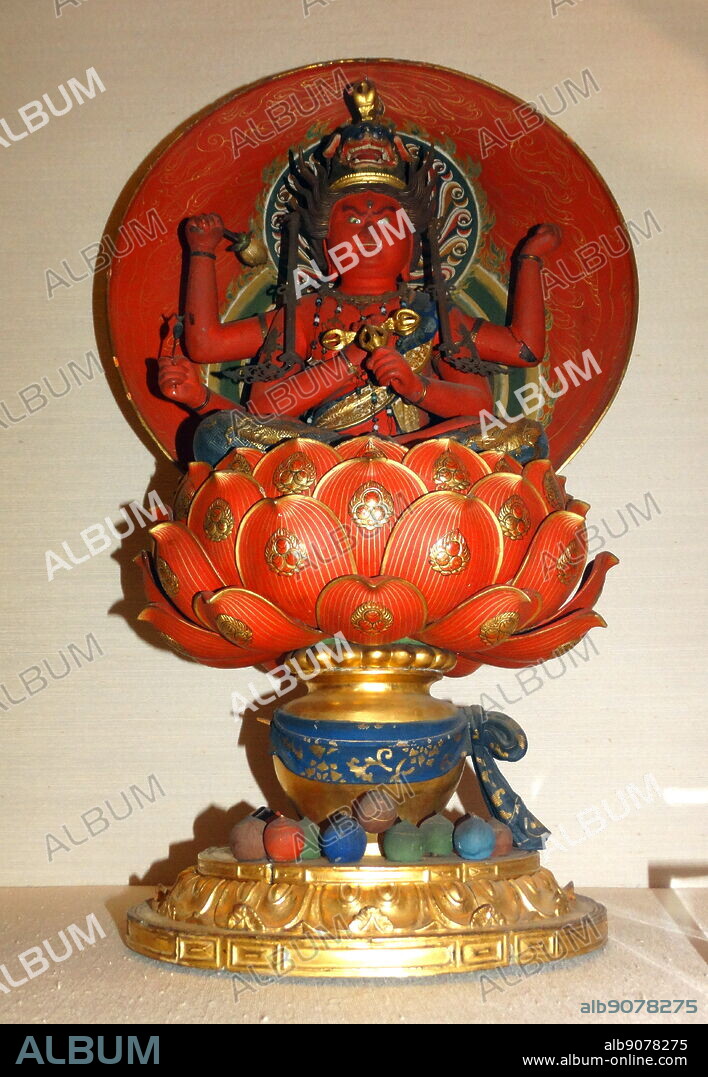 A Japanese painted wooden figurine of Aizen My?'? 'Passionate King of Light' a dharmapala deity from the Esoteric and Vajrayana Buddhism. Dated 15th Century.