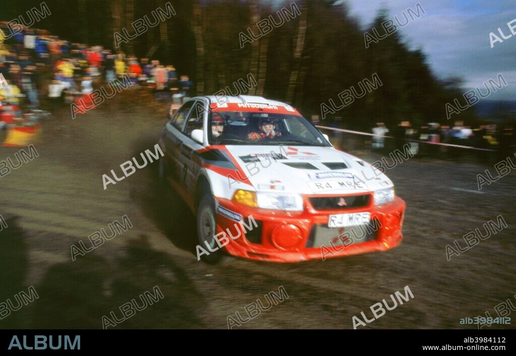 Richard Burns cornering on Network Q rally 1998 in Mitsubishi Lancer evo.