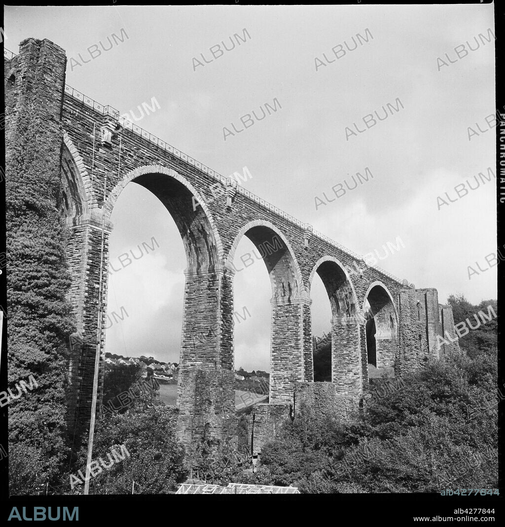 EILEEN DESTE. Moorswater Viaduct, Liskeard, Cornwall, 1967. Built in 1881, Moorswater Viaduct replaced an earlier viaduct of 1859 by Isambard Kingdom Brunel. Some of the piers of the earlier structure are still standing and are visible to the right of the frame.