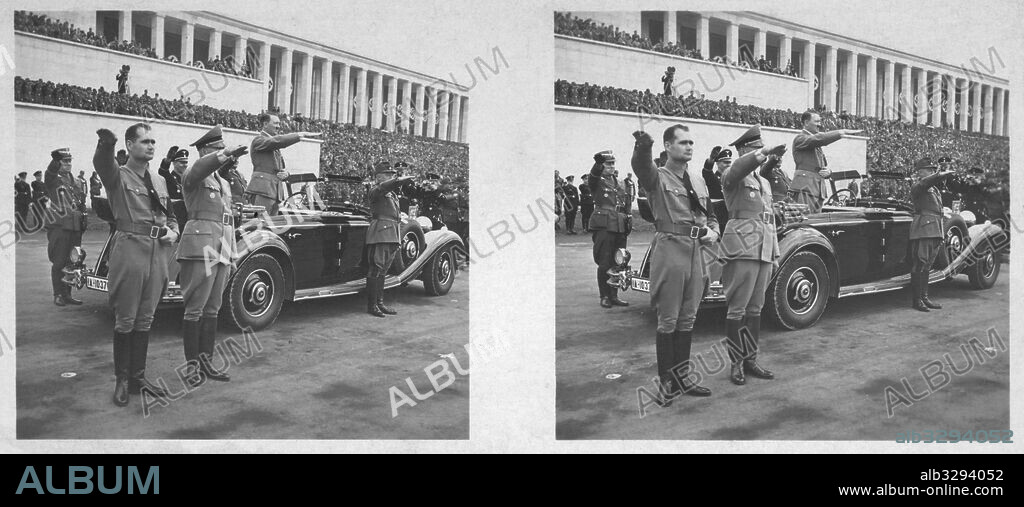Adolf Hitler salutes the massed gathering at the 1936 Nuremberg Rally of Honour.