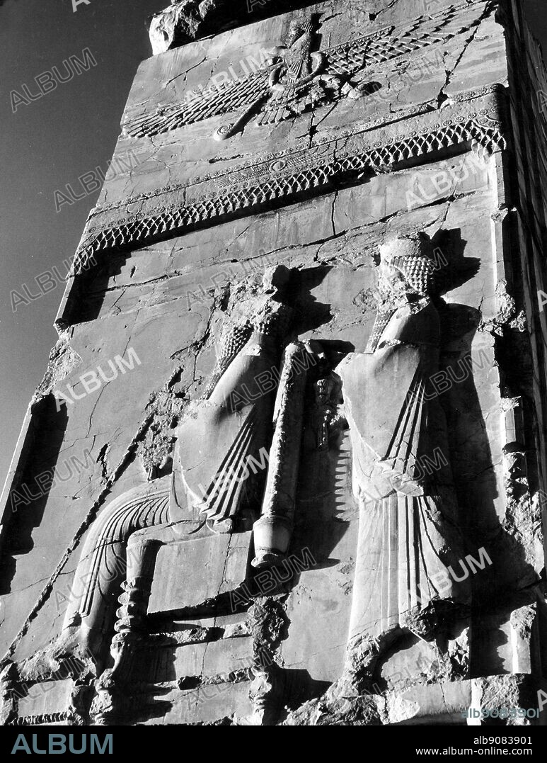 Eastern warfare/ Persepolis- the symbol of Ahura Mazda, the seated figure of a king and a standing figure. Built by Darius between 512 and 494 B.C.