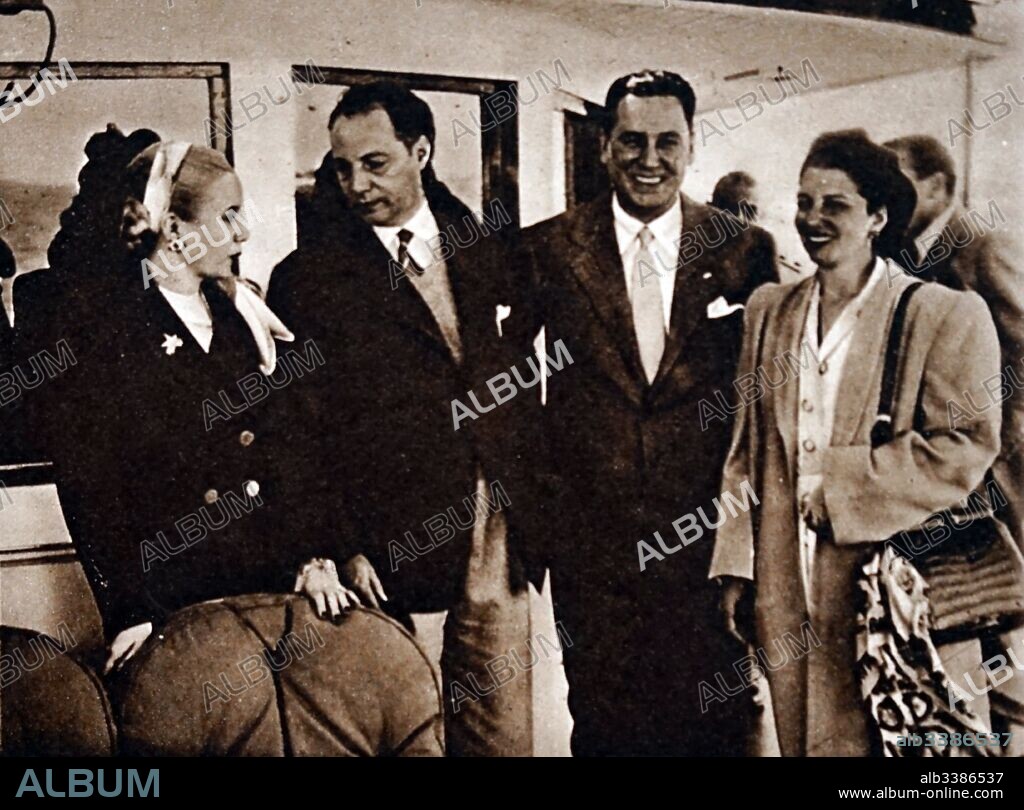 Photograph of Luis Batle Berres (1897-1964) a Uruguayan political figure and Juan Peron (1895-1974) Argentine lieutenant general and politician. Also pictured Eva Peron (1919-1952) First Lady of Argentina and film actress. Dated 20th Century.