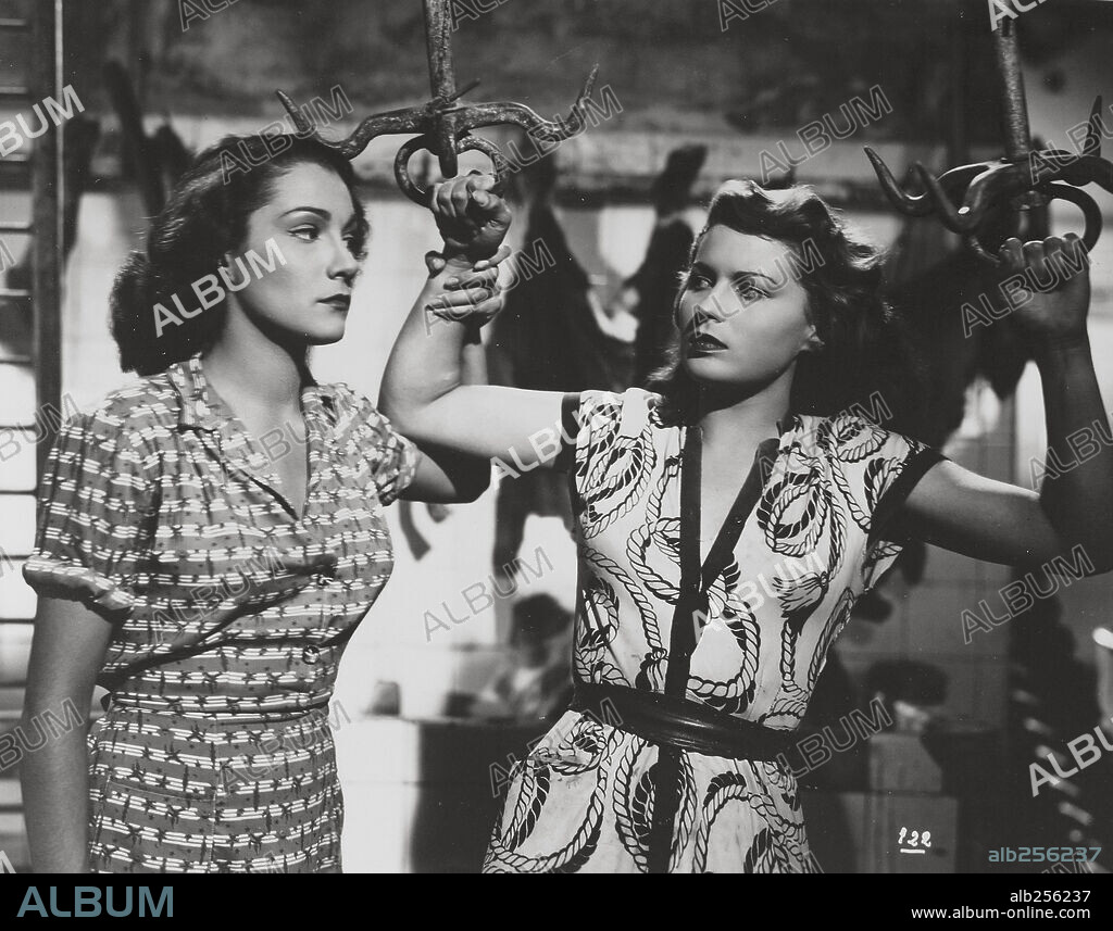 DORIS DOWLING and SILVANA MANGANO in BITTER RICE, 1949 (RISO AMARO), directed by GIUSEPPE DE SANTIS. Copyright LUX/DE LAURENTIIS.