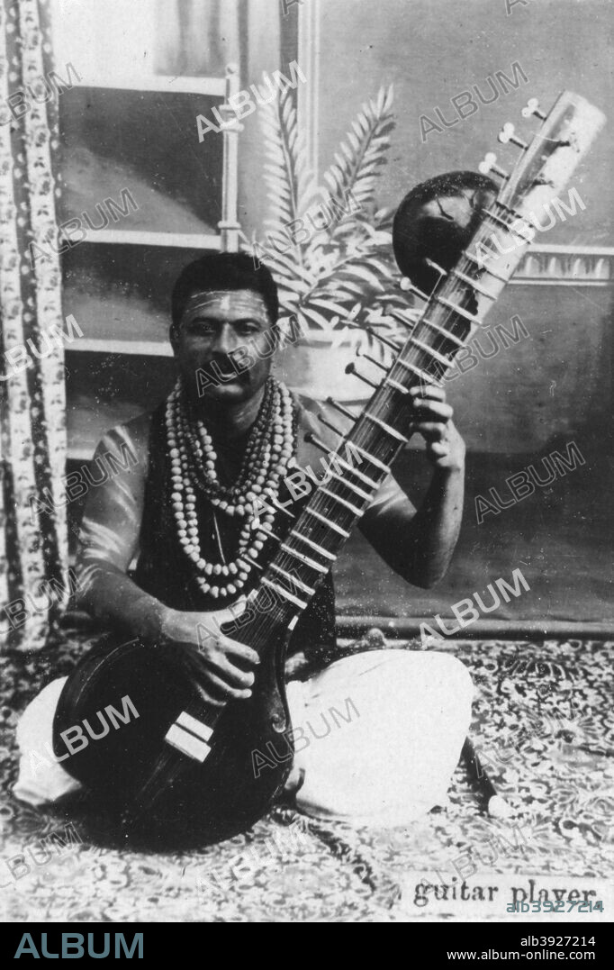 Sitar player, India, 20th century.