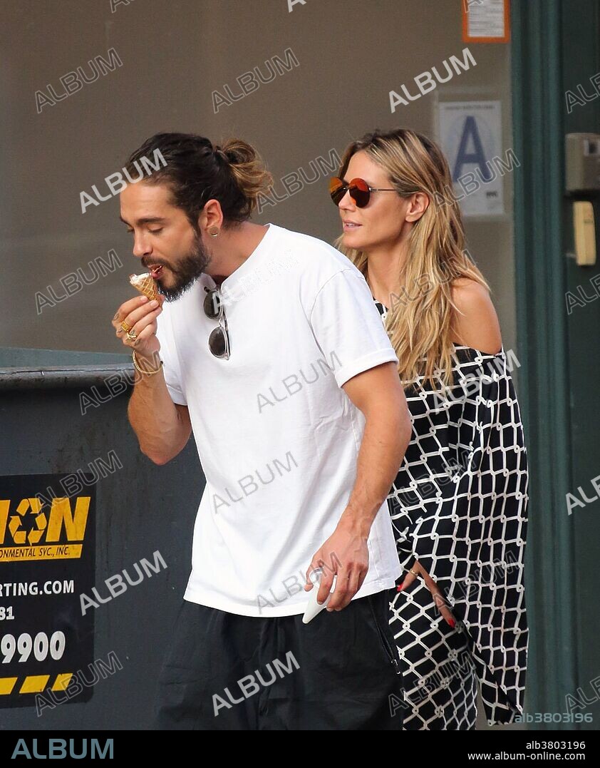 July 2, 2018 - New York, New York, United States - TV personality Heidi Klum and her boyfriend musician Tom Kaulitz enjoy ice creams with Klum's daughter Lou Samuel on July 2 2018 in New York City. 02/07/2018