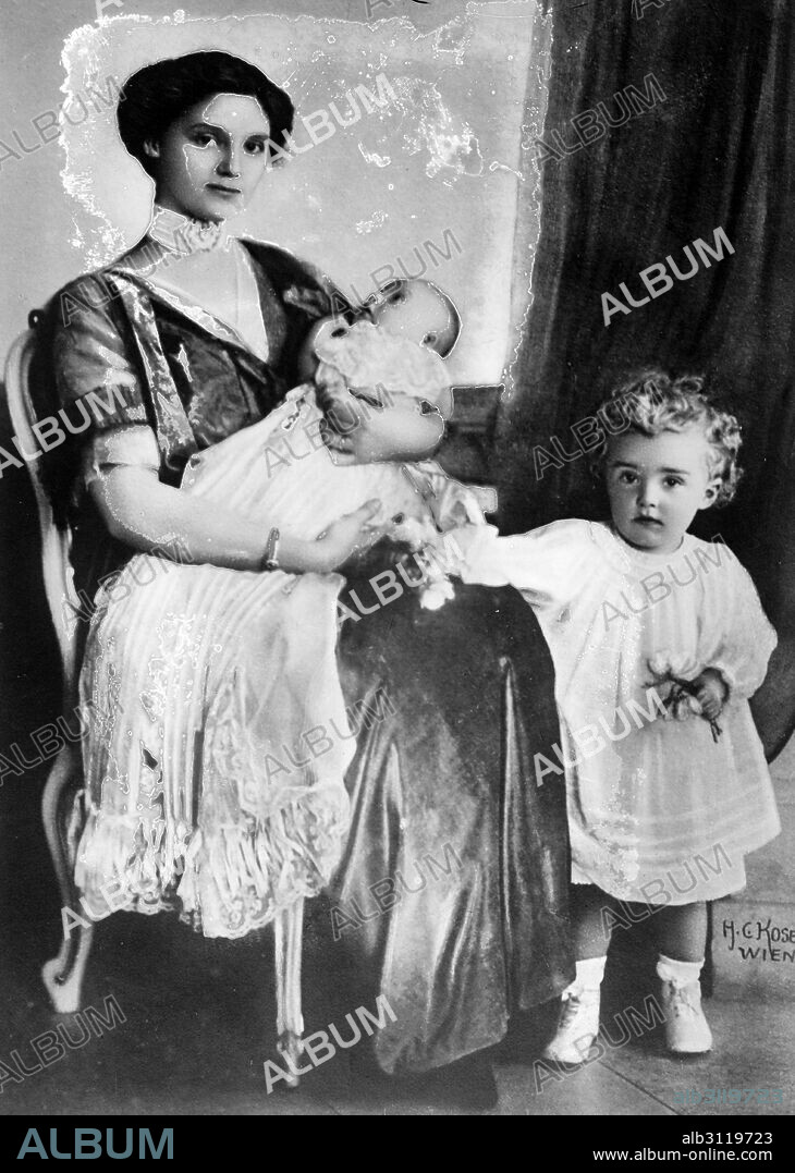 Princess Zita of Bourbon-Parma (1892-1989), the wife of Emperor Charles of Austria with her son Otto von Habsburg (1912-2011), the last Crown Prince of Austria-Hungary and her baby Archduchess Adelheid of Austria (1914-1971).