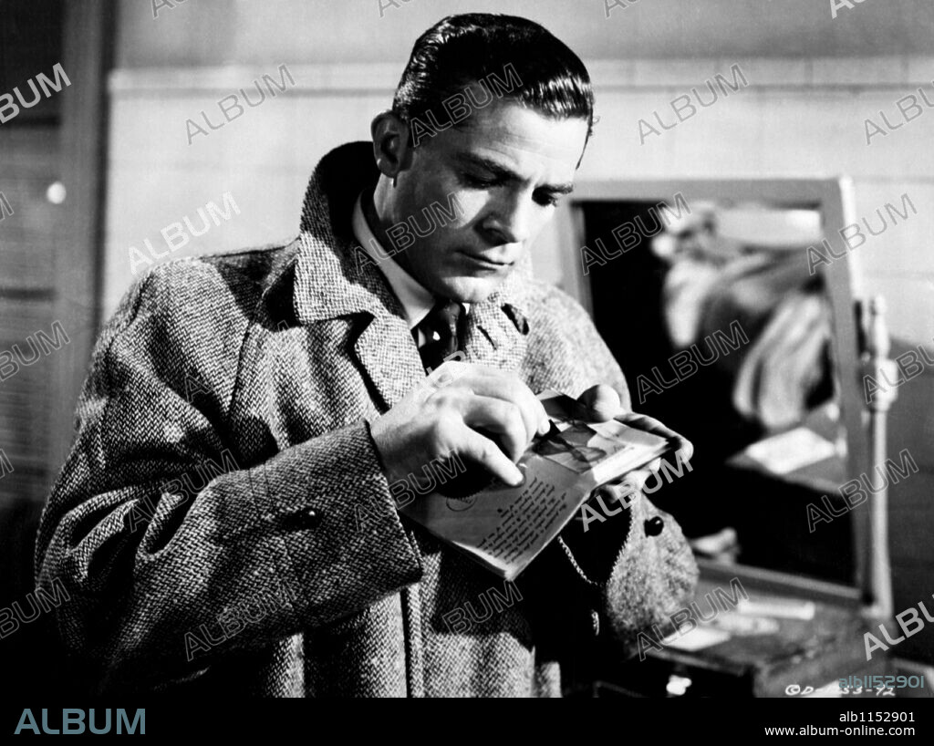 DANA ANDREWS in EUROPEAN EDITION, 1952 (ASSIGNMENT: PARIS), directed by ROBERT PARRISH. Copyright COLUMBIA PICTURES.