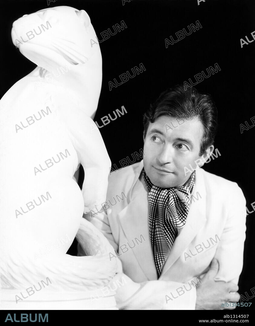 CLAUDE RAINS.