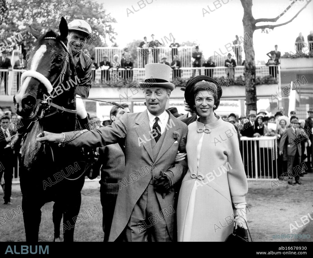 Baron and Baroness Guy de Rothschild with their horse White Label after he won the Grand Prix de Paris in Longchamp. 29th June 1964.