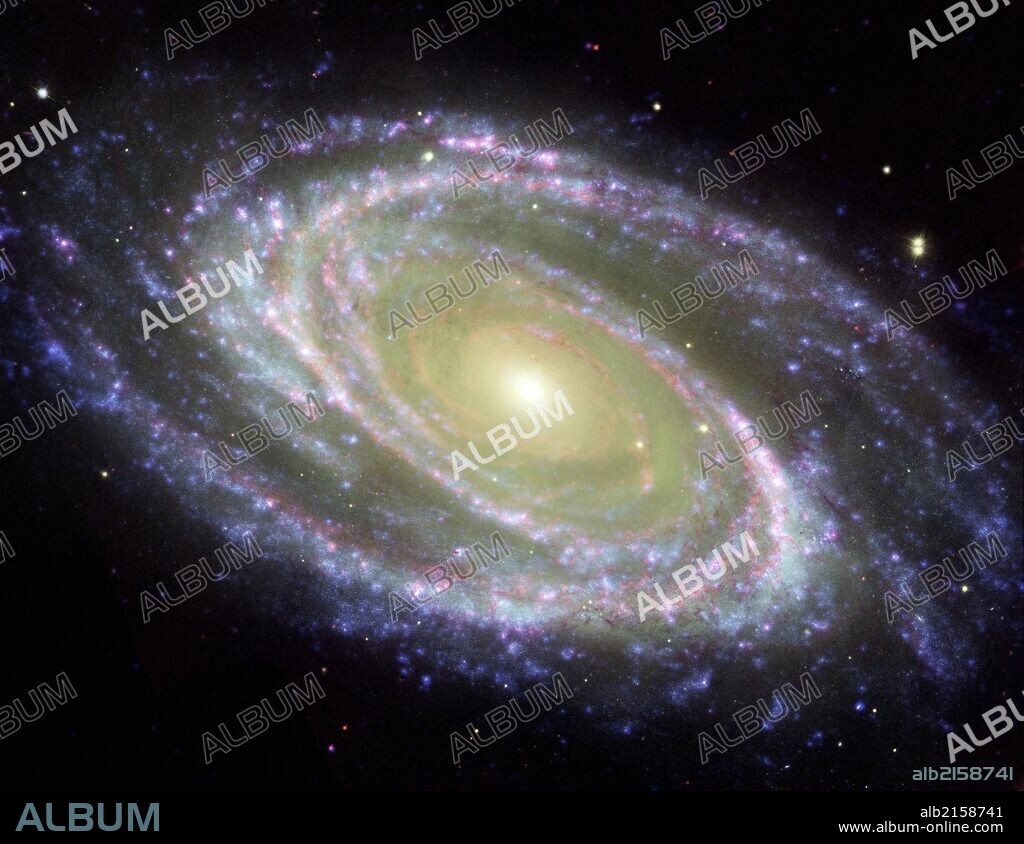 The spiral galaxy known as Messier 81, or M81. GALEX Orbiter,Hubble Space Telescope,Spitzer Space Telescope.  (Photo by: Universal History Archive/UIG via Getty Images).