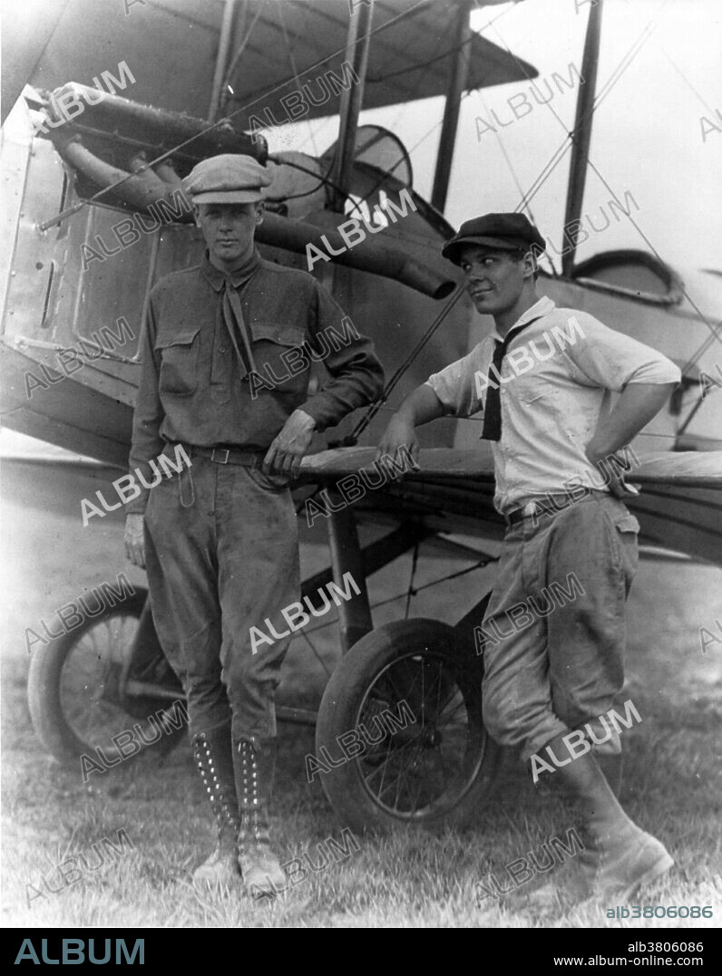 Lindbergh and Harlan "Bud" Gurney standing by plane at Lambert Field, St. Louis, Missouri. Circa 1923-28. Charles Augustus Lindbergh (February 4, 1902 - August 26, 1974) was an American aviator, author, inventor, and social activist. He gained world fame for his solo non-stop flight on May 20-21, 1927, from Roosevelt Field, Long Island to Le Bourget Field in Paris, nearly 3,600 statute miles, in the single-seat, single-engine purpose built Ryan monoplane Spirit of St. Louis. He was awarded the Medal of Honor for his historic exploit. Lindbergh used his fame to promote the development of commercial aviation and Air Mail services in the US and the Americas. In 1932, his son, Charles, Jr., was kidnapped and murdered in what was dubbed the "Crime of the Century". The Lindbergh family went into voluntary exile in Europe in 1935 and did not return to the US until 1939. In his later years, he became a prolific prize-winning author, international explorer, inventor, and environmentalist. Lindbergh spent his final years on Maui, where he died of lymphoma in 1974 at age 72.