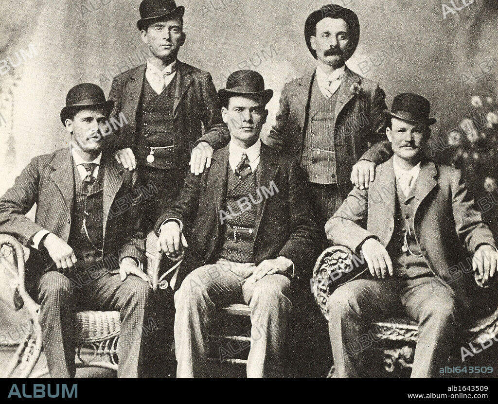 The Wild Bunch, 1901, gang of American outlaws, bank and train robbers, led by Butch Cassidy, seated right. Cassidy, born Robert LeRoy Parker (1866-1908): Standing left, William Carver (1866-1901): Standing right, Harvey Logan alias Kid Curry (1867-1904) cowboy and gunman: Seated left, Harry Alonzo Longbugh or Longbaugh (1867-1908) alias The Sundance Kid:  Seated centre, Ben Kilpatrick (1874-1912).