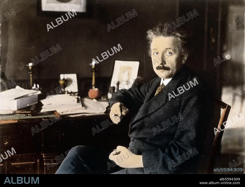 Einstein, Albert Physicist Ulm 14.3.1879 - Princeton (N.J.) 18.4.1955. Einstein in his study in Berlin.- Photo, 1921 (R.Sennecke); coloured later.