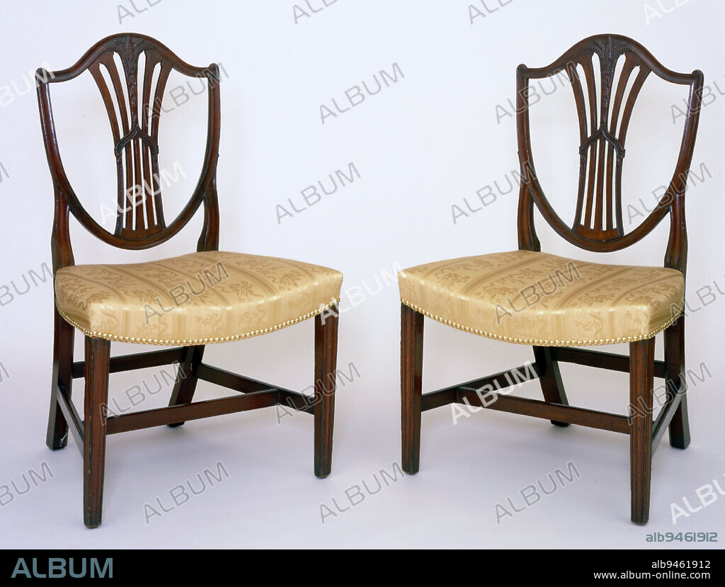 Hepplewhite side chair, one of a pair, c. 1795, Stephen Badlam, American (Massachusetts), American, 1751-1815, 37 1/2 x 23 x 19in. (95.2 x 58.4 x 48.3cm), Mahogany, ash, United States, 18th-19th century, Stephen Badlam was a leading American furniture maker during the Federal period. He set up his shop in Dorchester Lower Mills, Massachusetts, and was one of a number of furniture makers to mark his furniture with a stamp. Badlam and many of his peers drew inspiration from British design source books such as George Hepplewhite's Cabinet-Maker and Upholsterer's Guide (1788). This chair is one of a pair; the other is currently on view nearby in the MacFarlane Room.