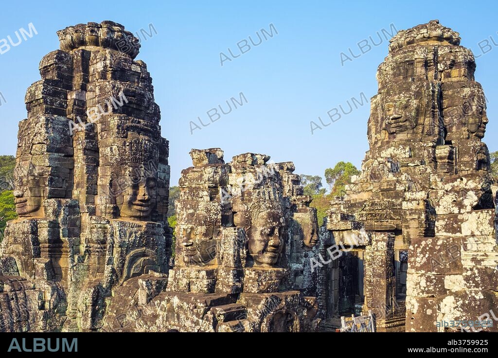 Carved stone faces at Prasat Bayon temple ruins, Angkor Thom, UNESCO World Heritage Site, Siem Reap Province, Cambodia, Indochina, Southeast Asia, Asia.