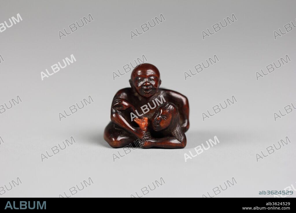 Netsuke of a Man Holding a Mermaid. Culture: Japan. Date: 18th century.