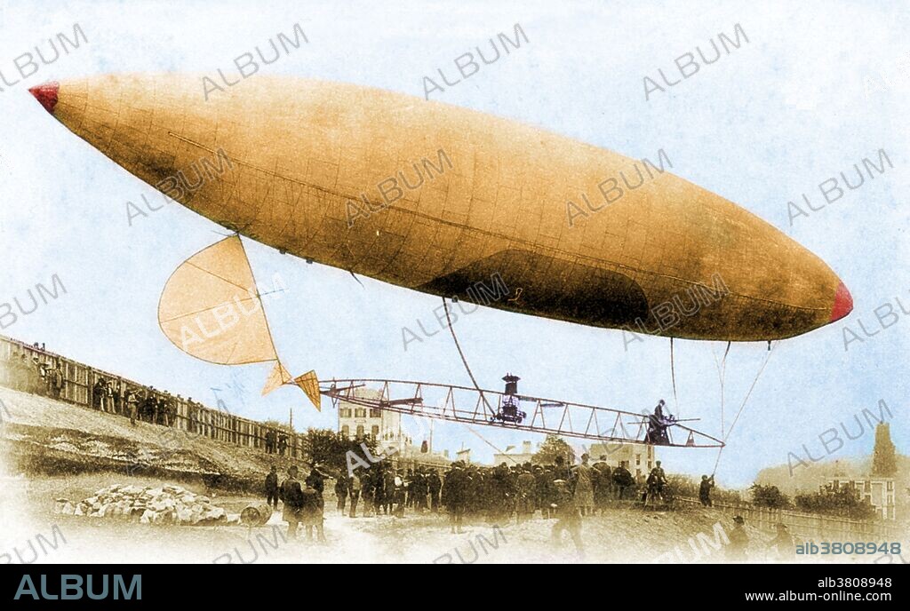 The Santos-Dumont No. 6 was an airship designed and built by the Brazilian pioneer aviator Alberto Santos-Dumont. In 1901 it was used by him to win the Deutsch de la Meurthe prize for a return from Parc Saint Cloud to the Eiffel Tower and back. Santos-Dumont took off from Saint-Cloud on October 19th at 2:42 pm. With the wind behind him, he reached the Eiffel Tower in nine minutes, but on the return journey but then suffered an engine failure. To restart the engine, he had to climb back over the gondola rail without a safety harness. The attempt was successful, and he reached the finish line after 29 minutes 30 seconds. There was a short delay before his mooring line was secured, and at first the adjudicating committee refused him the prize. This caused a public outcry from the crowds watching the flight, as well as comment in the press. A face-saving compromise was reached, and Santos-Dumont was awarded the prize. In a charitable gesture, he gave half the prize to his technicians and donated the other half to the poor of Paris. Winning the de la Meurthe prize made him an international celebrity. No photographer credited, dated 1901.