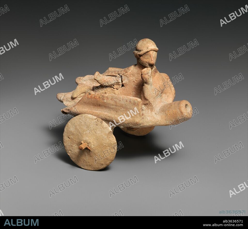 Terracotta model of a "cart". Culture: Cypriot. Dimensions: H. 4 3/4 in. (12.1 cm). Date: 6th century B.C..
This model differs from 74.51.1792 mainly in that the rail at the sides is higher. A single male occupant holds a cup.