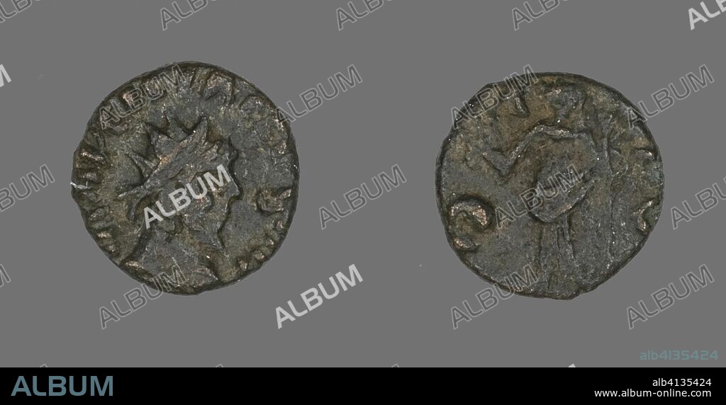 ANCIENT ROMAN. Coin Portraying the Radiate Bust of an Emperor. Roman. Date: 201 AD-300 AD. Dimensions: Diam. 1.2 cm; 1.06 g. Bronze. Origin: Roman Empire.