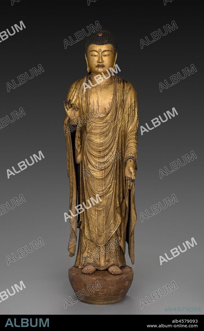 Buddha of Infinite Life and Light (Amida Nyorai), 1269. This ornate Buddha Amida stands in a posture of welcome, greeting the dying who will accompany him back to his Pure Land. Documents inserted into the sculpture?s hollow core around the time of its creation include a copy of the sacred text Amida Sutra, a register of donors who desired to be joined together in generating karmic merit (kechien) through the creation and dedication of the sculpture, and a record asserting that the image was completed over the course of 33 days in 1269 at Shitennoji Temple in Osaka. The lead sculptor was Koshun, who had been granted the lofty title "Bridge of the Law.".