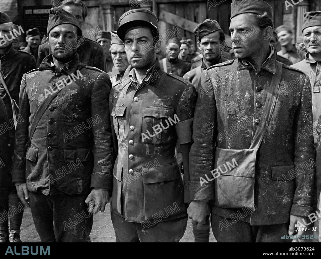 GENE KELLY, JEAN-PIERRE AUMONT and JOSEPH CALLEIA in THE CROSS OF LORRAINE, 1943, directed by TAY GARNETT. Copyright M.G.M.