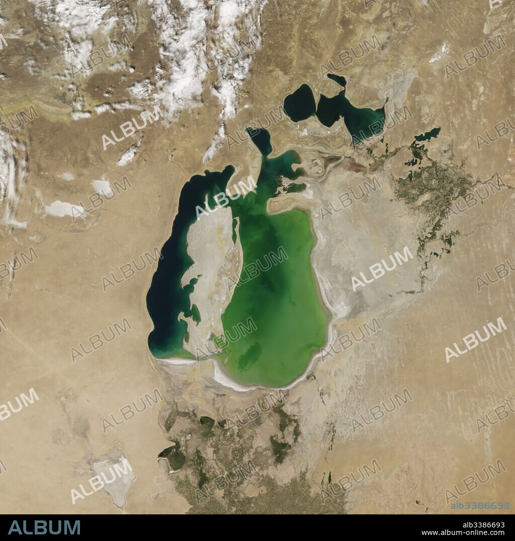 Satellite image of the shrinking of the Aral Sea taken in 2000. The Aral Sea, is a lake lying between Kazakhstan, in the north and Uzbekistan in the south. The name roughly translates as 'Sea of Islands', referring to over 1,100 islands that once dotted its waters; Formerly one of the four largest lakes in the world with an area of 68,000 km2 (26,300 sq mi), the Aral Sea has been steadily shrinking since the 1960s after the rivers that fed it were diverted by Soviet irrigation projects.