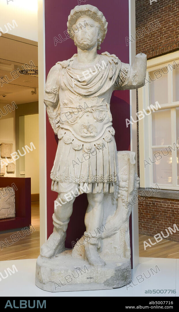 Portrait of Roman emperor in armor. Lower arms broken, head not belonging to body. On the armor griffins and eagle, on the pteruges ram, griffin, panther, lion, shields, rosettes. The not belonging head is under and and, sculpture, marble, 226 x 90 x 65 cm, 1240 kg, imperial time 175.