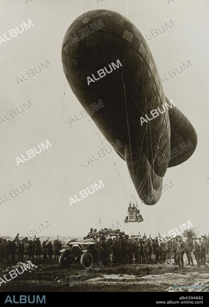 Photograph - Observation Balloon, Ypres, Belgium, World War I, 1917, One of a collection of eleven photographs depicting images from World War I. The reverse of photographs feature an 'Australian Official Photograph' copyright stamp and hand written inscriptions by Captain Morris Lewis of the 44th Battalion. The photographs show servicemen and areas of conflict, including the Balkans, the Middle East, Belgium and northern France during World War I.