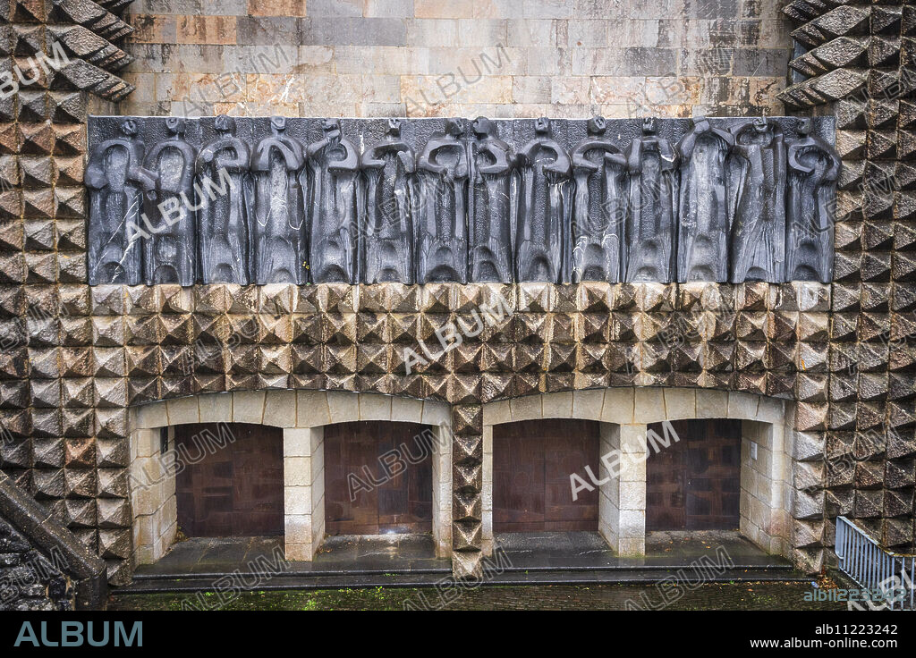 sculptures of the 14 apostles on the façade, sculptor Jorge Oteiza, and iron doors by Eduardo Chillida, Arantzazu Sanctuary, municipality of Oñati, , Basque Country, Spain.
