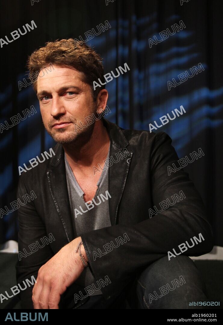Nov. 7, 2012 - New York, New York, U.S. - Actor GERARD BUTLER stars in and produced the surfing movie 'Chasing Mavericks,' which celebrates Jay Moriarity, a famed surfer who died in a diving accident in 2001 at age 22. Another film, 'Playing for Keeps,' a romantic comedy about a sports star who tries to get his life together by coaching his son's soccer team, opens in Dec. 2012. 07/11/2012