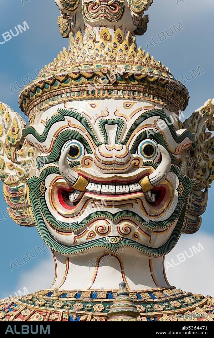 Close-up of the statue of the giant Yaksha demon, Wirunchambang, guarding the gates, Grand Palace, Bangkok, Thailand, Asia.